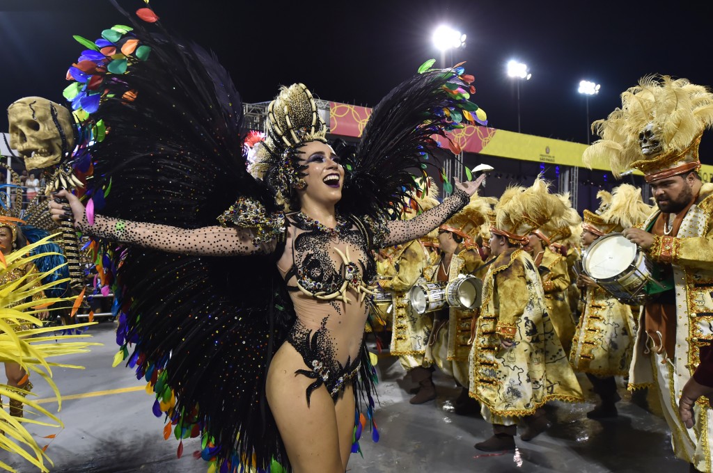 Revelers of the Unidos de Vila Maria samba school perform during the first night of the carnival parade at the Sambadrome in Sao Paulo, Brazil, on February 6, 2016. AFP PHOTO/NELSON ALMEIDA / AFP / NELSON ALMEIDA